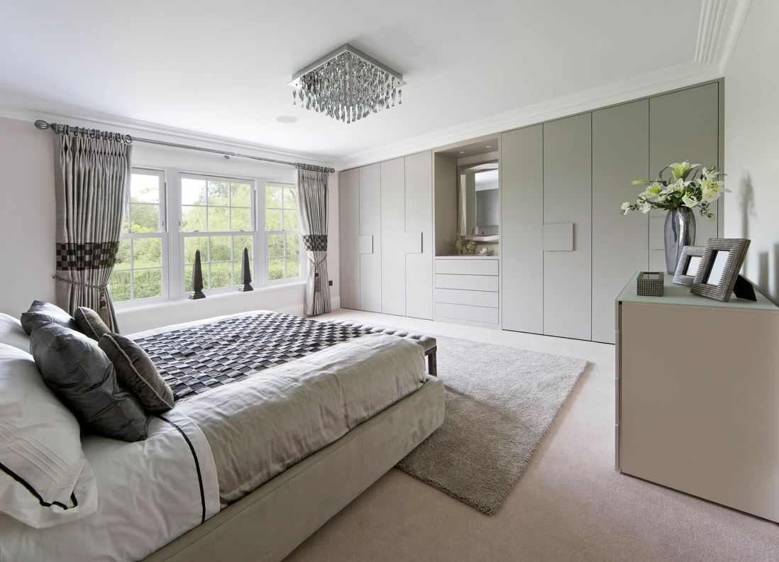 bedroom with large fitted wardrobe